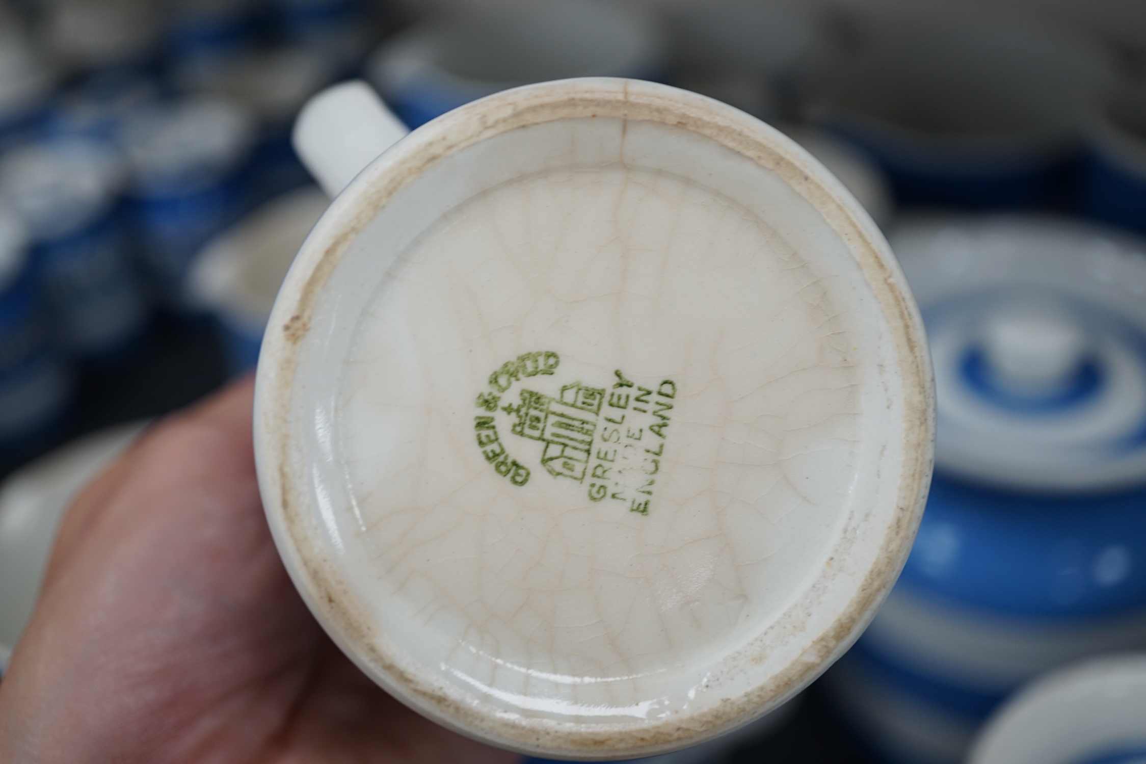 T.G.Green Cornish Kitchenware, eight unnamed lidded storage jars, largest 17cm high, eight jugs and two utensil holders, Green Church and Shield marks. Condition - poor, fair and good